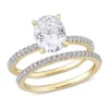 Top 10 🔥 Lab Created 2 ct. t.w. Oval Moissanite and 1/4 ct. t.w. Diamond Bridal Ring Set in 14k Yellow Gold by Belk & Co. 🔥