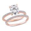 Flash Sale ✨ Lab Created 2 ct. t.w. Oval Moissanite and 1/4 ct. t.w. Diamond Bridal Ring Set in 14k Rose Gold by Belk & Co. ⭐