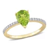 Deals 🤩 Pear Shape Peridot and 1/7 CT TW Diamond Ring in 14k Yellow Gold by Belk & Co. 🧨