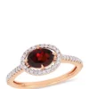 Outlet 🥰 Garnet and 1/4 ct. t.w. Diamond Halo Ring in 10K Rose Gold by Belk & Co. 💯
