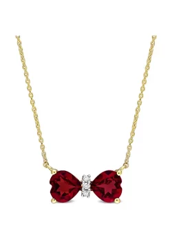 Discount 👍 1 ct. t.g.w. Garnet and Diamond Accent Bow Necklace in 10K Yellow Gold by Belk & Co. 🥰