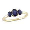 Buy 😀 1 ct. t.g.w. Blue Sapphire and 1/10 ct. t.w. Diamond 3-Stone Ring in 10K Yellow Gold by Belk & Co. ⭐