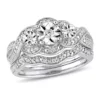 Discount 🎉 1/4 ct. t.w. Diamond 3-Stone Bridal Set in Sterling Silver by Belk & Co. 🛒